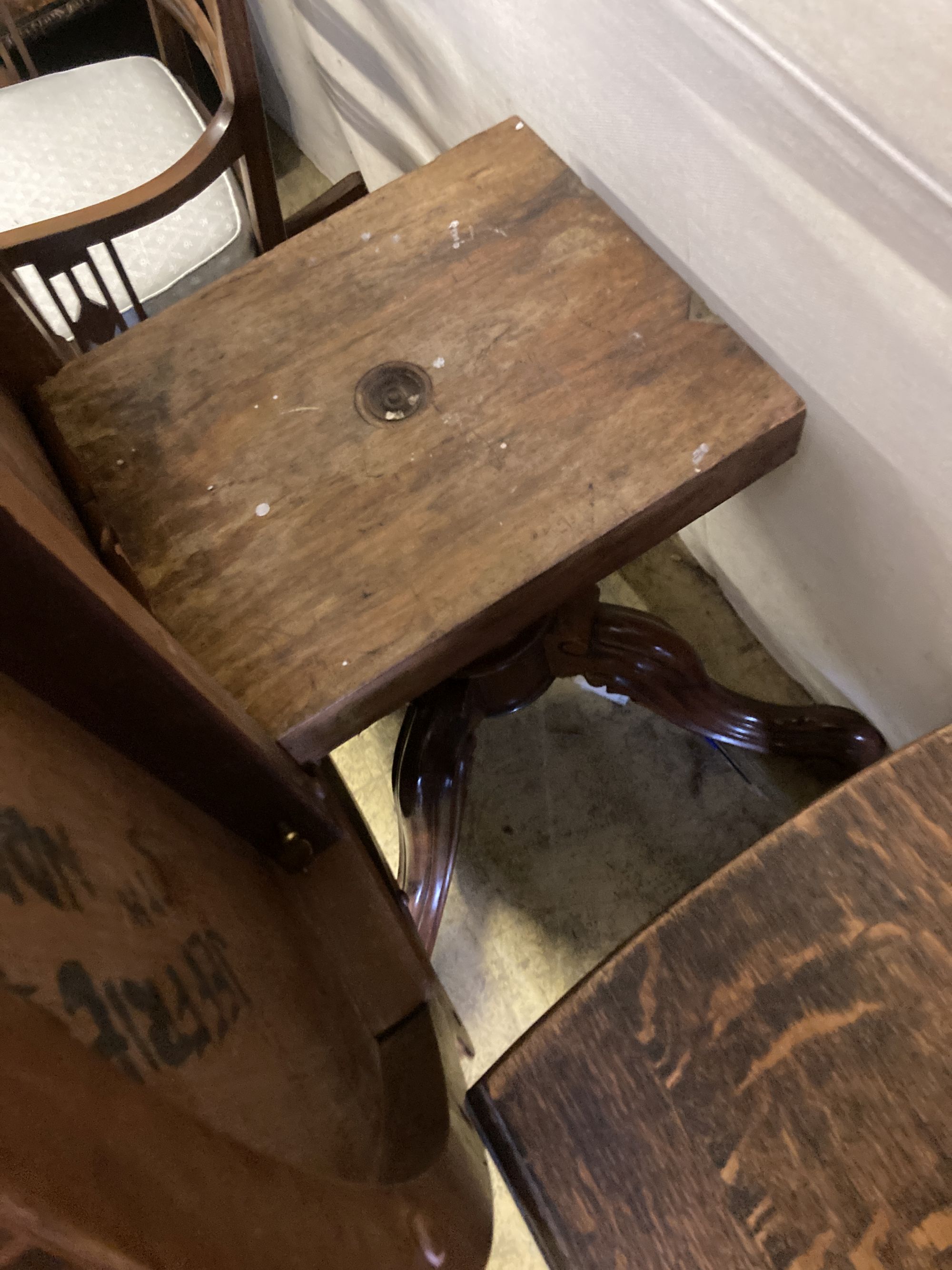 A Victorian rosewood oval tilt top loo table, length 150cm, depth 110cm, height 74cm and a matched set of six Victorian mahogany balloo
